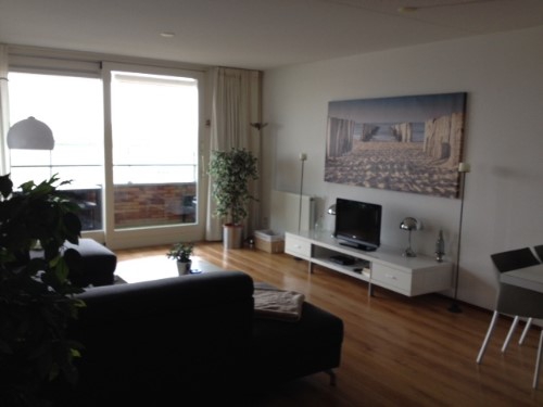 Woonkamer appartement Strand en Duin